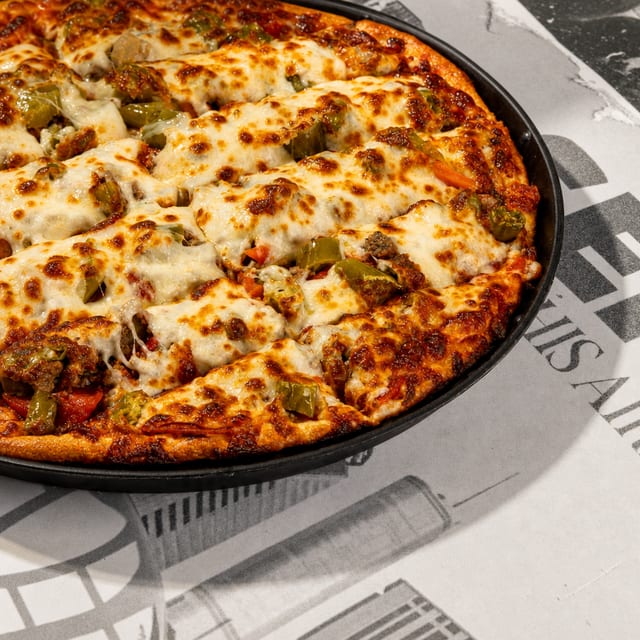 $13 Tuesday Medium 2-topping pizza.